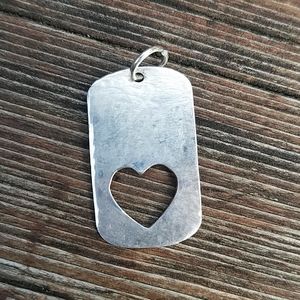Metal Pendant With Cut Out Heart